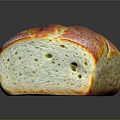 Freshly Baked Bread With Golden Crust And Soft Interior On Black Surface