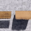 Two Thatch Roof Garden Ornament Structures Against Rough Gray Wall With Shadows