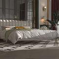 Elegant Double Bed with White Headboard Bedspread Pillows Nightstand Table Lamp and Black White Rug