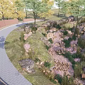 Beautiful Park Landscape Featuring Winding Path Lush Trees Natural Rocks And Colorful Flowers