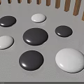 Pebble Shaped Black And White Circular Landscape Seats On Ground With Wooden Fence