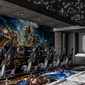Gaming Themed Hotel Room With Game Mural Large Screens Gaming Chairs Starry Ceiling