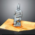 Detailed Ancient Terracotta Warrior Sculpture in Kneeling Pose on Wooden Base