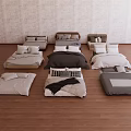 Double Beds With Various Colored Styled Bed Sheets Light Colored Walls Wooden Flooring 3d model
