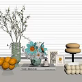 Elegant Decorative Ornament Combination With Green Vase White Flowers Books And Fruit Bowl