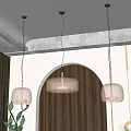 Sleek Modern Interior Three Glass Pendant Lights Gold Accents Arched Doorway Green Plants