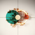Modern Geometric Wall Decor With Green Orange Circular Dots And Gold Rings Design