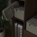 Fabric Storage Bins On Wooden Shelf With Green Plants And Silver Luggage