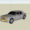 Red Rolls-Royce Sedan Driving On Open Highway With Mountain Sunset View