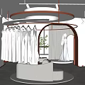 Elegant Bridal Shop Interior Design With Wedding Dress Mannequin Sofa Mirror And Potted Plant