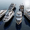 Multiple Sleek Yachts Moored In Marina On Calm Blue Water With Modern Design