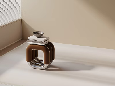 Modern Side Table With Metal Frame Brown Upholstery Stacked Books And Small Bowl 3d model