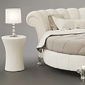 Elegant Round Double Bed With Quilted Mattress Soft Pillows White Side Tables And Table Lamps