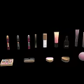 Perfume And Cosmetics Display With Lipsticks Foundation Bottles Eyeshadow Palettes And Blush