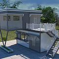 Two Story Container Building With Balcony White Railings And Staircase In Green Environment