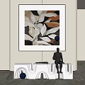 Abstract Leaf Painting With Blue Balloon And Human Figure Sculpture On White Furniture