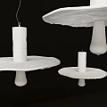Modern Textured White Pendant Lights With Visible Bulbs Hanging In Black Background