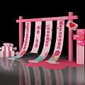 Pink Themed Photo Check-in Spot with Frame Structure Heart Decoration and Striped Pillars