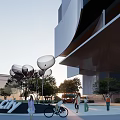 Modern Commercial Street Featuring Glass Shop Windows Pedestrians Green Trees And Walkway