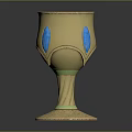 Elegant Golden Decorative Cup With Blue Accents And Intricate Patterned Base