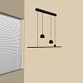 Modern Minimalist Pendant Light with Long Bar and Three Black Spherical Bulbs in Indoor Interior