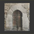 Traditional Arch Wooden Door With Carved Details Set In Rustic Stone Wall Structure