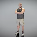 Bald Bearded Man With Arms Crossed Wearing Gray Sleeveless Tank Top And Camouflage Shorts Standing