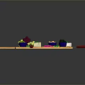Assorted Cheese Platter with Grapes Blue Bowls on Wooden Cutting Board and Red Handle Knives