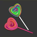 Colorful and Pink Heart Shaped Lollipops with Swirl Patterns and Different Colored Sticks