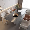 Modern Rectangular Dining Table Set with White and Tan Chairs and Decorative Fruit Bowl on Top