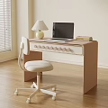 Modern Pastel Desk with Circular Knobs Laptop Table Lamp Stack of Books and White Wheeled Chair