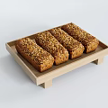 Four Multigrain Bread Loaves on Wooden Tray with Toasted Seeds