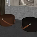 Round Leather Ottoman Stools in Brown and Black with Handle Straps for Living Room