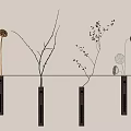 Wall Decor With Slim Black Vases Mounted On White Wall Displaying Dried Branches And Plants