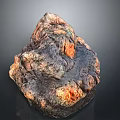 Natural Rock With Colorful Orange Black Brown Hues And Rough Textured Surface