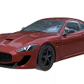 Red Maserati Sports Coupe With Sleek Design Black Wheels And Front Grille