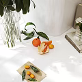 Minimalist Home Decorative Ornament Set With Glass Vases Books Green Foliage White Flowers And Oranges