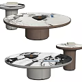 Modern Round Coffee Table With Marble Surface And Brown Base Featuring Magazine And Decorative Items 3d model
