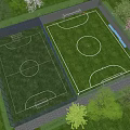 Aerial View Of Two Soccer Fields With Green Grass Purple Flowers And Trees