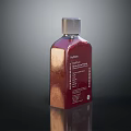 Elegant Red Cosmetic Perfume Bottle With Silver Cap And Metallic Label Design