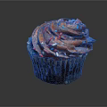 Delicious Cupcake With Brown Frosting And Colorful Sprinkles On Paper Cup