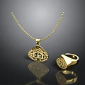 Gold Jewelry Set With Intricate Pendant Necklace And Detailed Ring Design