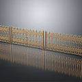Golden Metal Wrought Iron Fence With Intricate Patterns And Reflective Surface