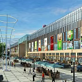 Vibrant Commercial Street With Modern Glass Building Colorful Billboards And Outdoor Seating