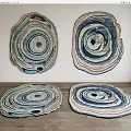 Four Artistic Shaped Rugs With Layered Circular Patterns
