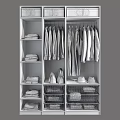 Open Wardrobe Organized With Hanging Shirts Coats Folded Clothes And Storage Baskets