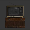 Vintage Television with Antenna on Brown Wooden Cabinet with Drawers and Yellow Black Case