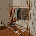 Bedroom Interior With Golden Clothes Rack Hanging Coats Storage Rack Folded Clothes And Plush Toy