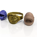 Decorative Ornaments Including Blue Helmet Gold Dragon Ring And Brown Creature Head