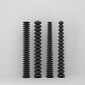 Four Black Spiral Candle Lamps With White Wicks On Grey Background